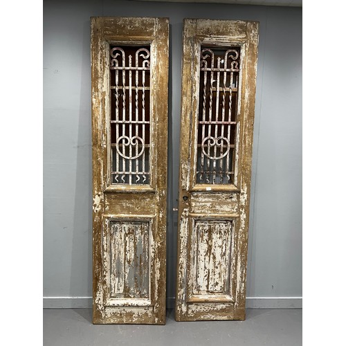 955N - Pair of early French doors with wrought iron panels
glass a/f
565mm x 2315mm