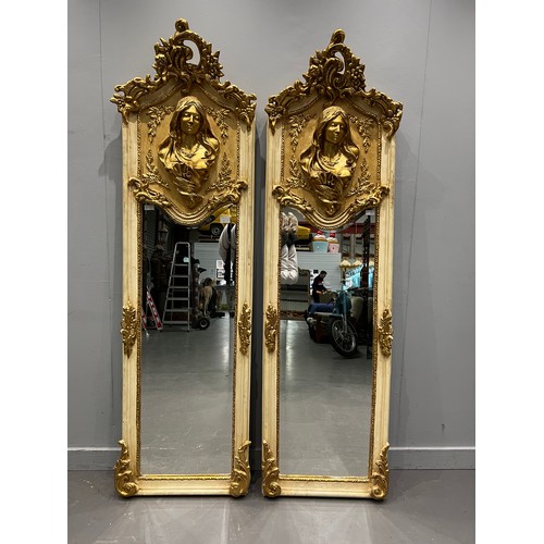 955V - Superb pair of french gilt his and hers mirrors