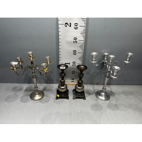 55 - Pair candelabras + pair candle sticks