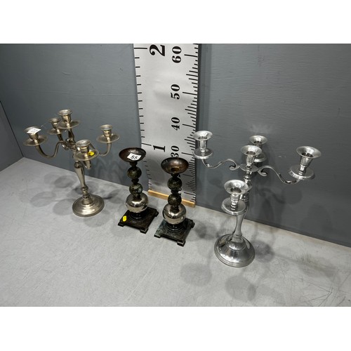 55 - Pair candelabras + pair candle sticks