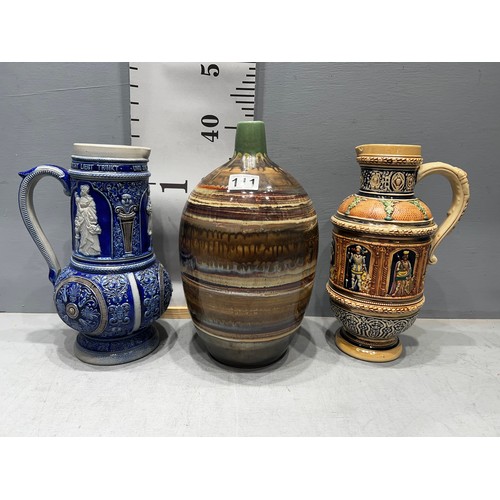 111 - 2 German steins + vase