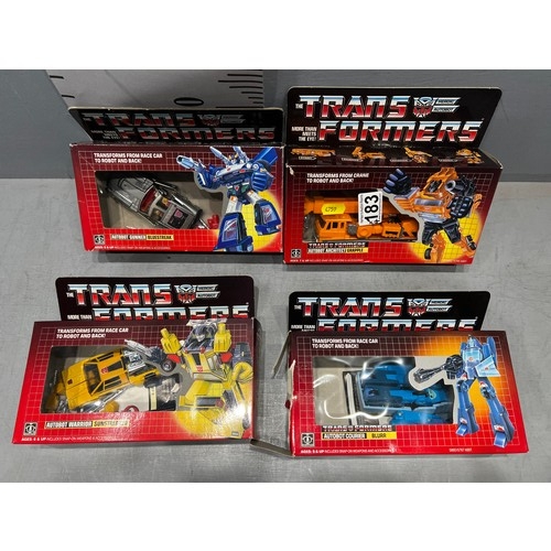 183 - 4 Boxed transformers figures in original box