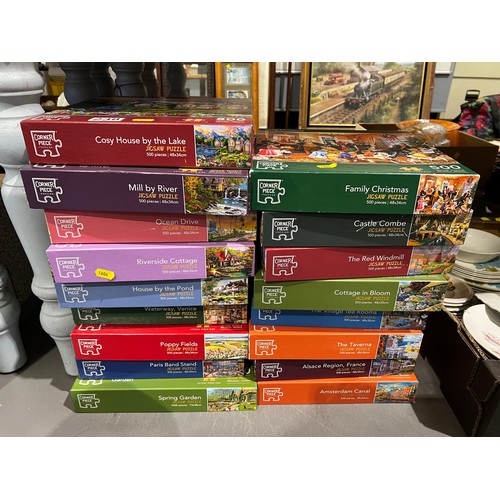 238 - Large collection of jigsaws