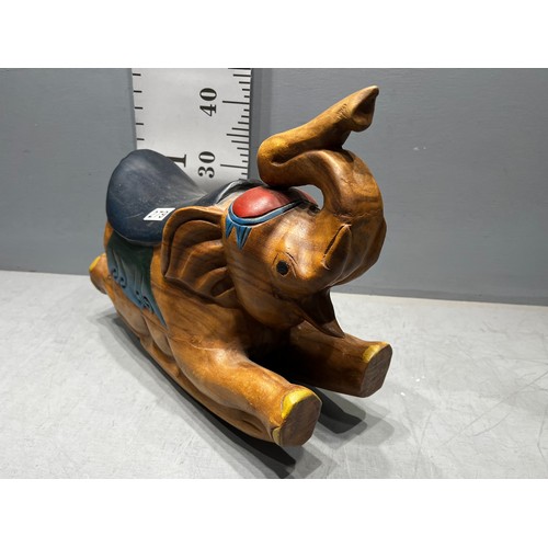 279 - Carved wooden rocking elephant