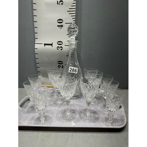 286 - Cut glass decanter + wine glasses