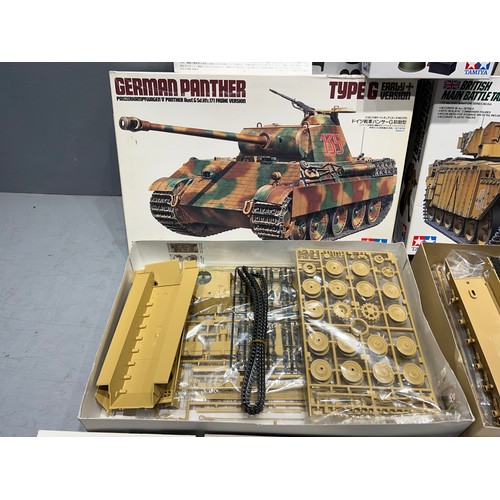 8 - 9 Assorted tamiya model kits challenger 1 tank, German panther tank, 5 military minitures, rocket la... 