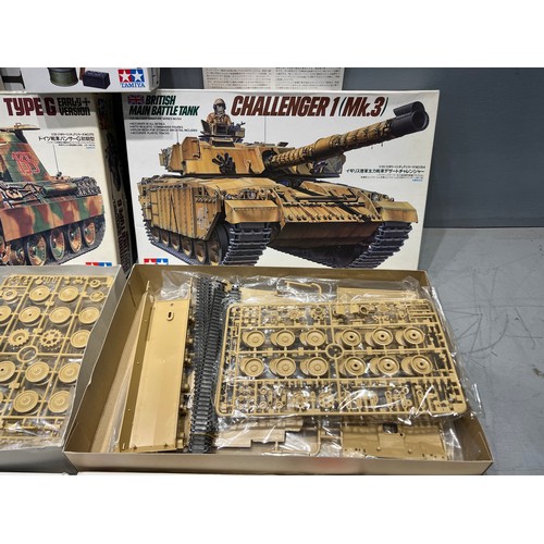 8 - 9 Assorted tamiya model kits challenger 1 tank, German panther tank, 5 military minitures, rocket la... 