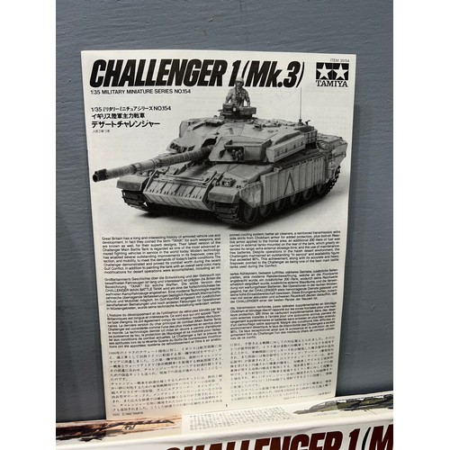 8 - 9 Assorted tamiya model kits challenger 1 tank, German panther tank, 5 military minitures, rocket la... 