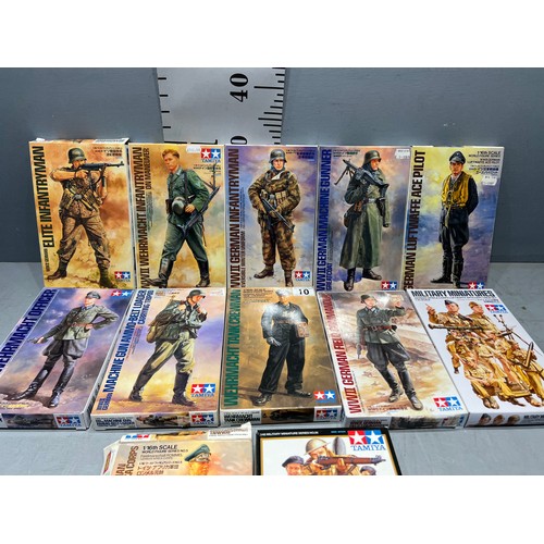 10 - 12 Tamiya model kits, infantry, tank crew, infantry, luftwaffe pilot, gunner, rommel etc