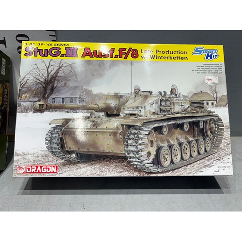 28 - 3 Dragon model kits, vk. 45 tank, stug 111 tank, German v-2 missile this is cellophane wrapped