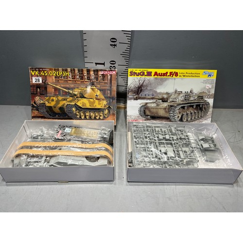 28 - 3 Dragon model kits, vk. 45 tank, stug 111 tank, German v-2 missile this is cellophane wrapped