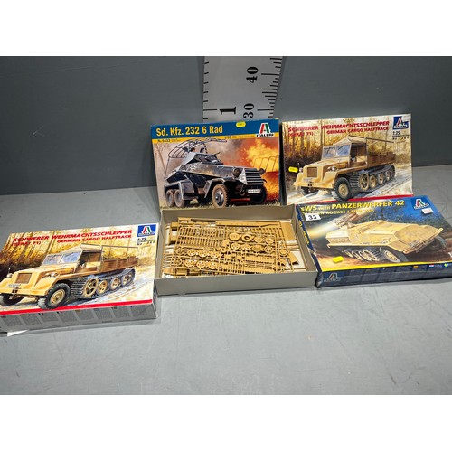 33 - 4 Italeri model kits, 2 cargo half track, 1 rad scout car, 1 panzerwerfer rocket launcher. 2 boxes a... 