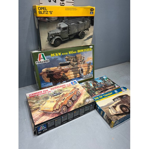 104 - 4 Italeri + 1 CMK models inc duck w, panzerspahwagen, opel blitz, coloniale & anti air craft gun