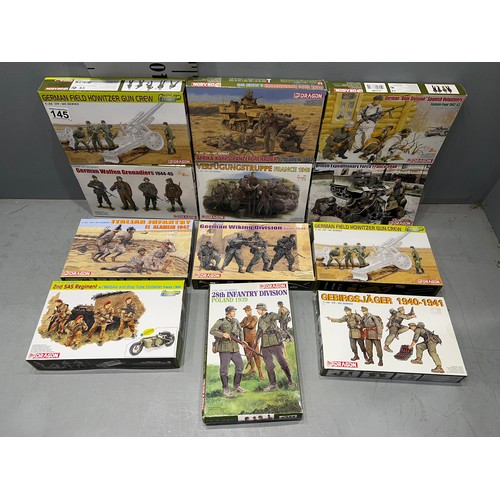 145 - 12 x Dragon troop kits with vehicles