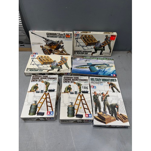 186 - 7 Tamiya kits inc V1 plane, AA gun + 5 miniatures