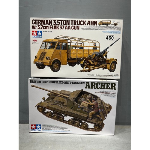 460 - 2x Tamiya kits inc, British antitank gun tank & German truck with flak 37AA gun