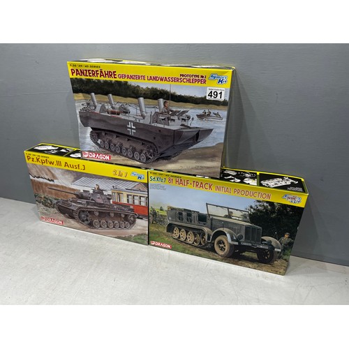 491 - 3x Dragon model kits inc, 1 tank 1 land & water tank & half track truck