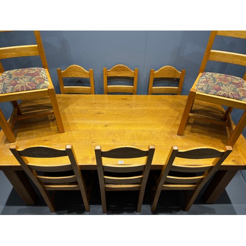 712 - Solid oak farmhouse table & 8 chairs