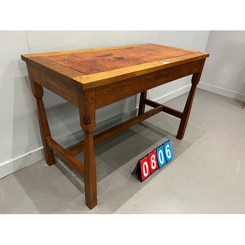 806 - 'Gnome man' adazed oak leather top table/desk with drawer