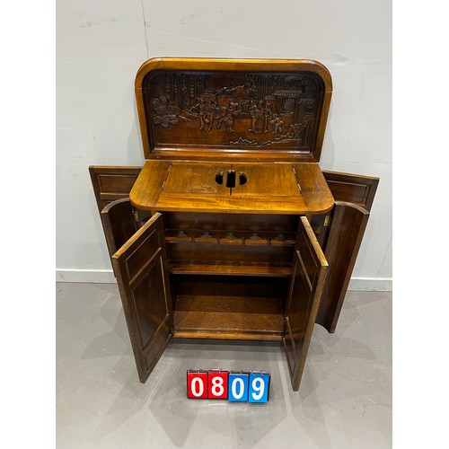 809 - 20th century carved Chinese cocktail cabinet with secret ends