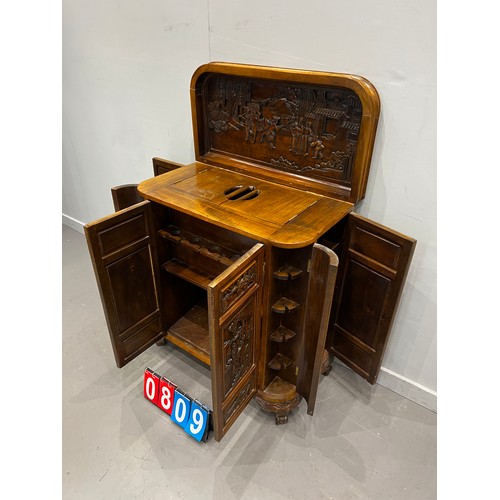 809 - 20th century carved Chinese cocktail cabinet with secret ends