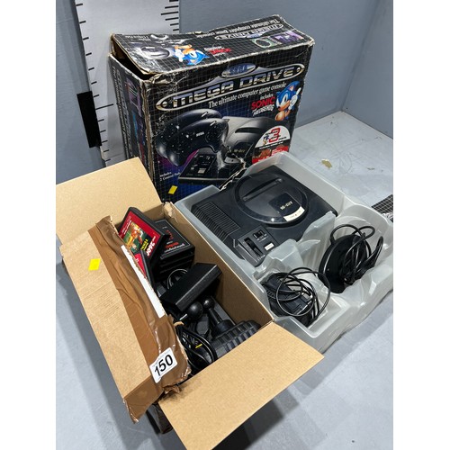 150 - Sega Megadrive games console + box games