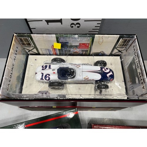 207 - 3 boxed Racing cars