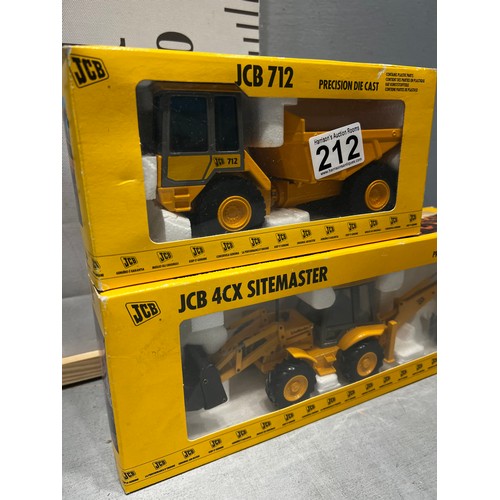 212 - 2 boxed JCB die cast toys