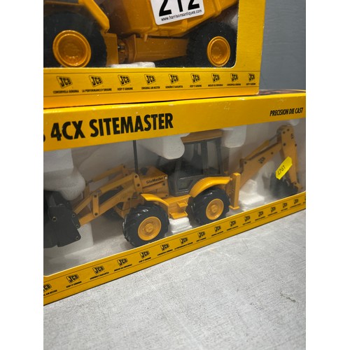 212 - 2 boxed JCB die cast toys