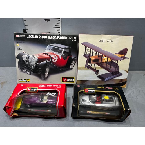 218 - 2 boxed model kits + 2 boxed Burago cars