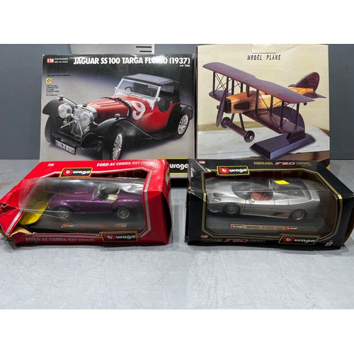 218 - 2 boxed model kits + 2 boxed Burago cars