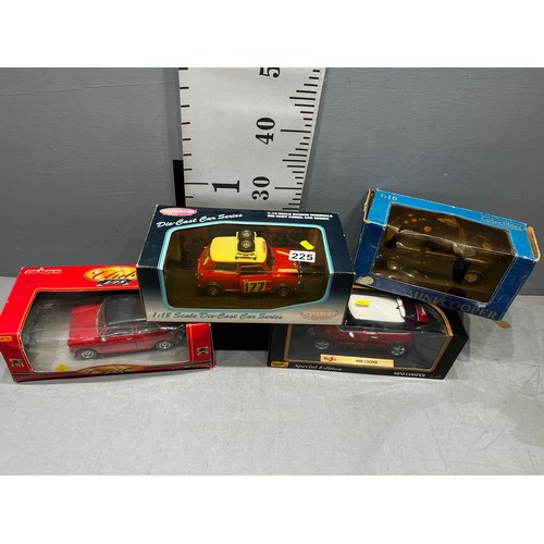 225 - 4 boxed model cars