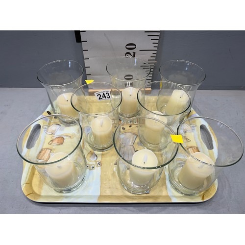 243 - 8 glass tea lights with candles