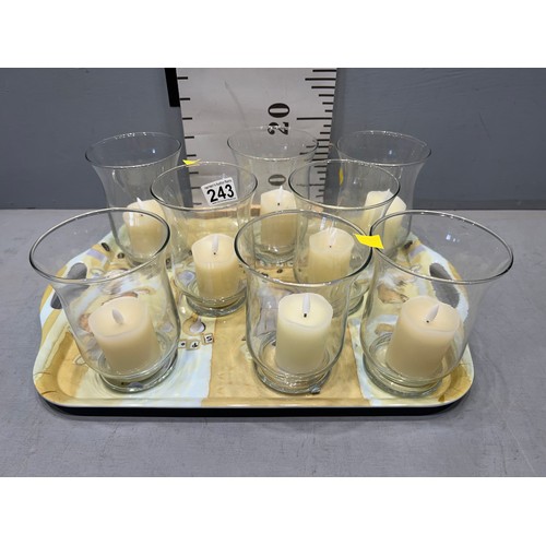 243 - 8 glass tea lights with candles