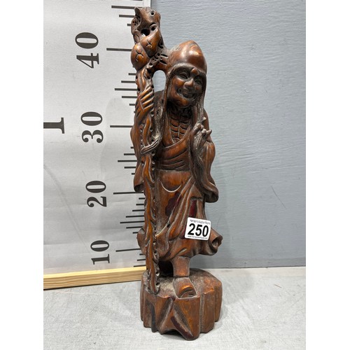 250 - Wooden oriental figure