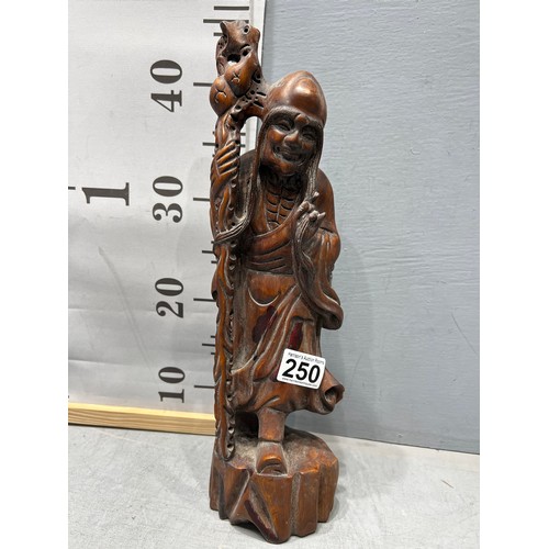 250 - Wooden oriental figure