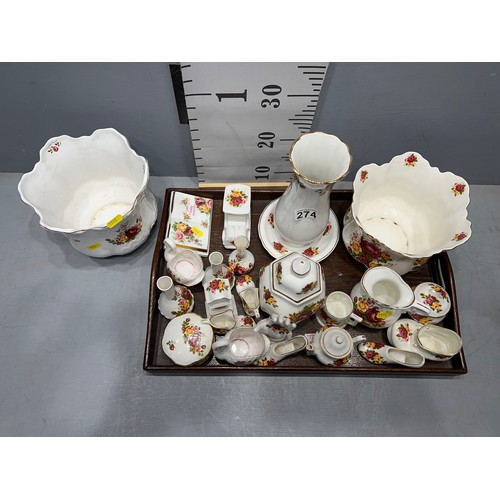 274 - Large collection of bone china in Royal Albert Design