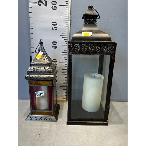 505 - 2 decorative lanterns with church candles