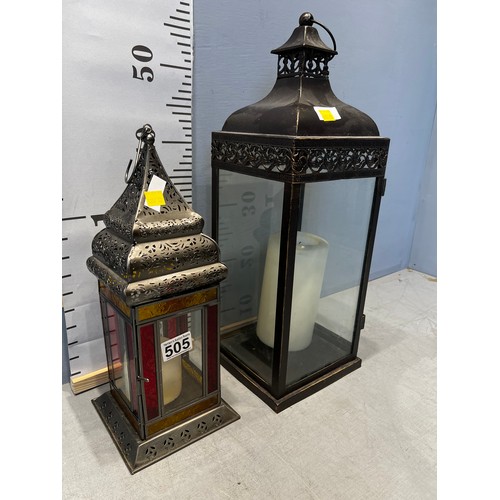 505 - 2 decorative lanterns with church candles