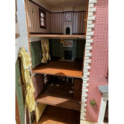 510 - Very large 4 storey dolls house + large quantity of dolls house furniture