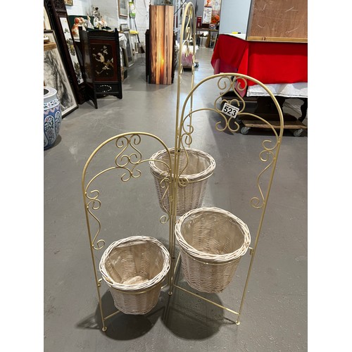 523 - Wrought iron plant stand with wicker plant pot holders