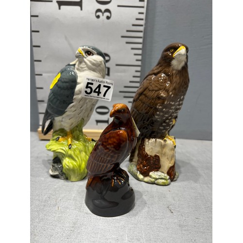 547 - 2 Royal Doulton eagles. Merlin + Buzzard. Whyte & Mackay whiskey + Beswick eagle