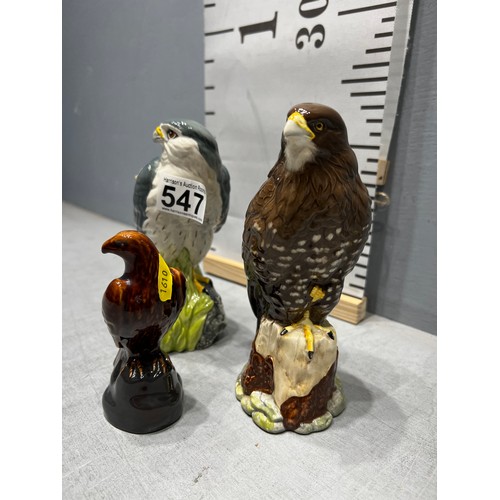 547 - 2 Royal Doulton eagles. Merlin + Buzzard. Whyte & Mackay whiskey + Beswick eagle