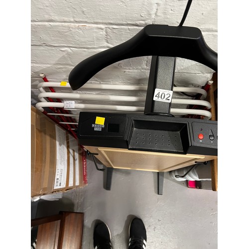 402 - Electric trouser press + clothes airer