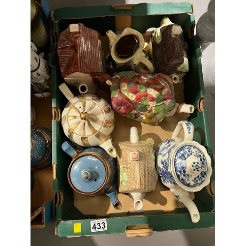 433 - 2 boxes pottery inc 8 assorted tea pots, vases, biscuit jars figures etc