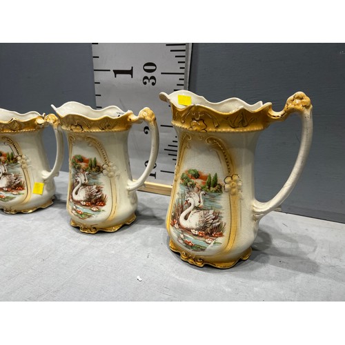 445 - 3 Victorian graduated jugs