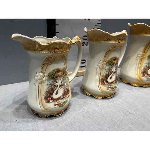 445 - 3 Victorian graduated jugs