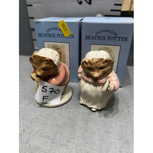 570F - Beswick Beatrix Potter 'Mrs Tigglywinkle ironing in satin' + 'Mrs Tigglywinkle buys provisions in gl... 