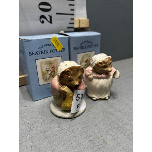 570F - Beswick Beatrix Potter 'Mrs Tigglywinkle ironing in satin' + 'Mrs Tigglywinkle buys provisions in gl... 