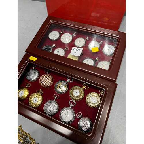 585I - 2 boxes of pocket watches + folder on watches